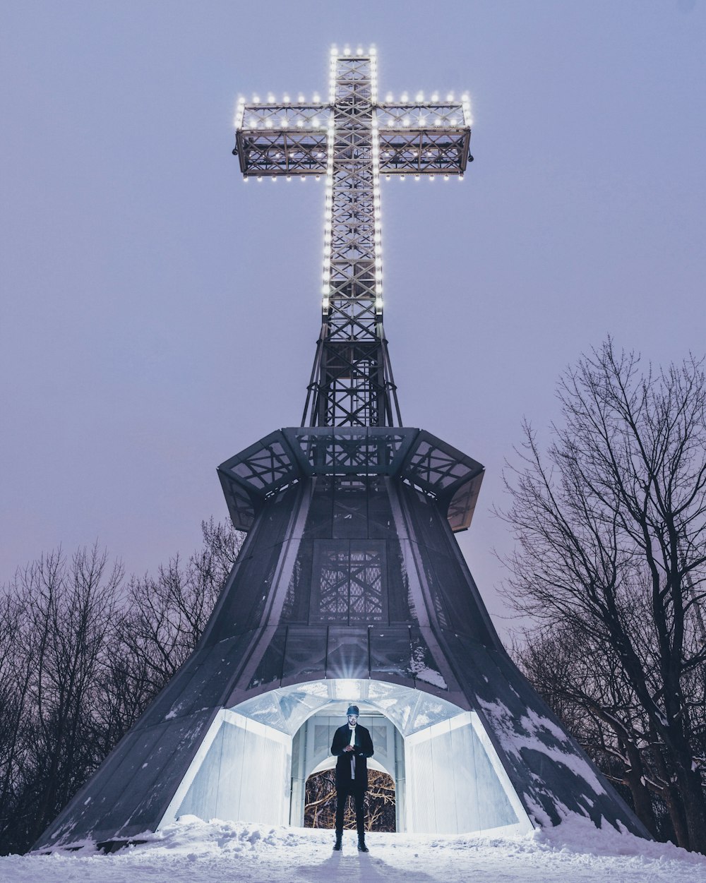 person standing near tower