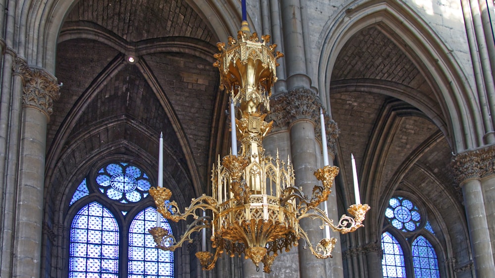 gold chandelier with candles