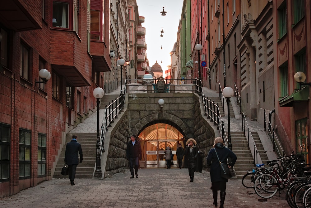 people walking near stairs