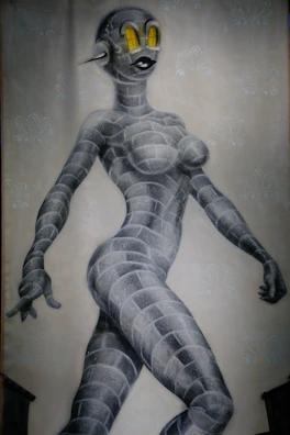 A minimalist boxed character with sharp edges and vibrant colors.