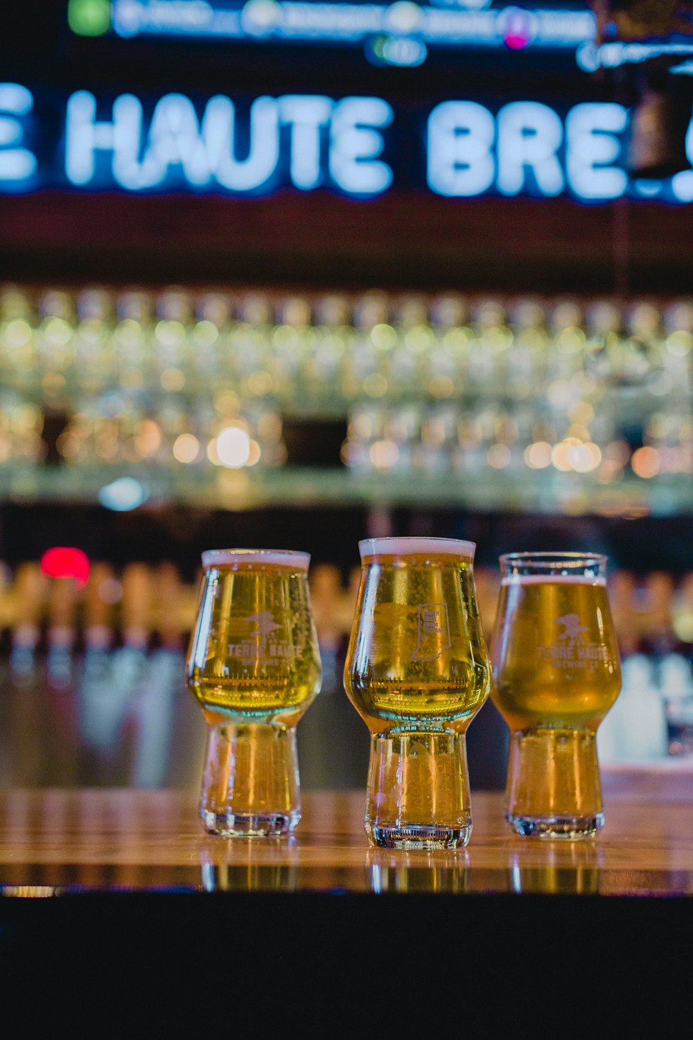 beer filled drinking glasses