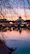building reflection on body of water
