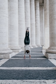person standing on both hands
