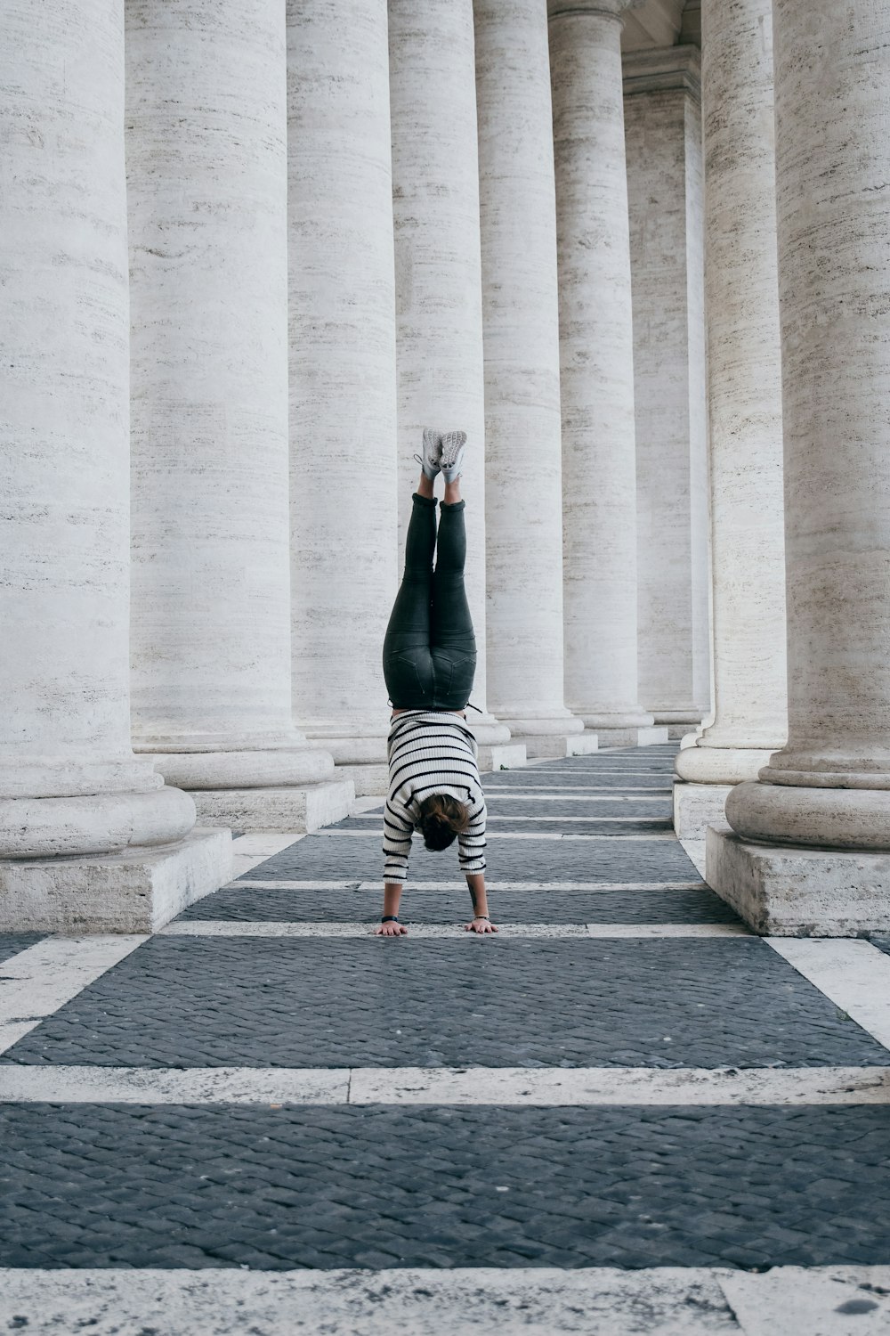 person standing on both hands