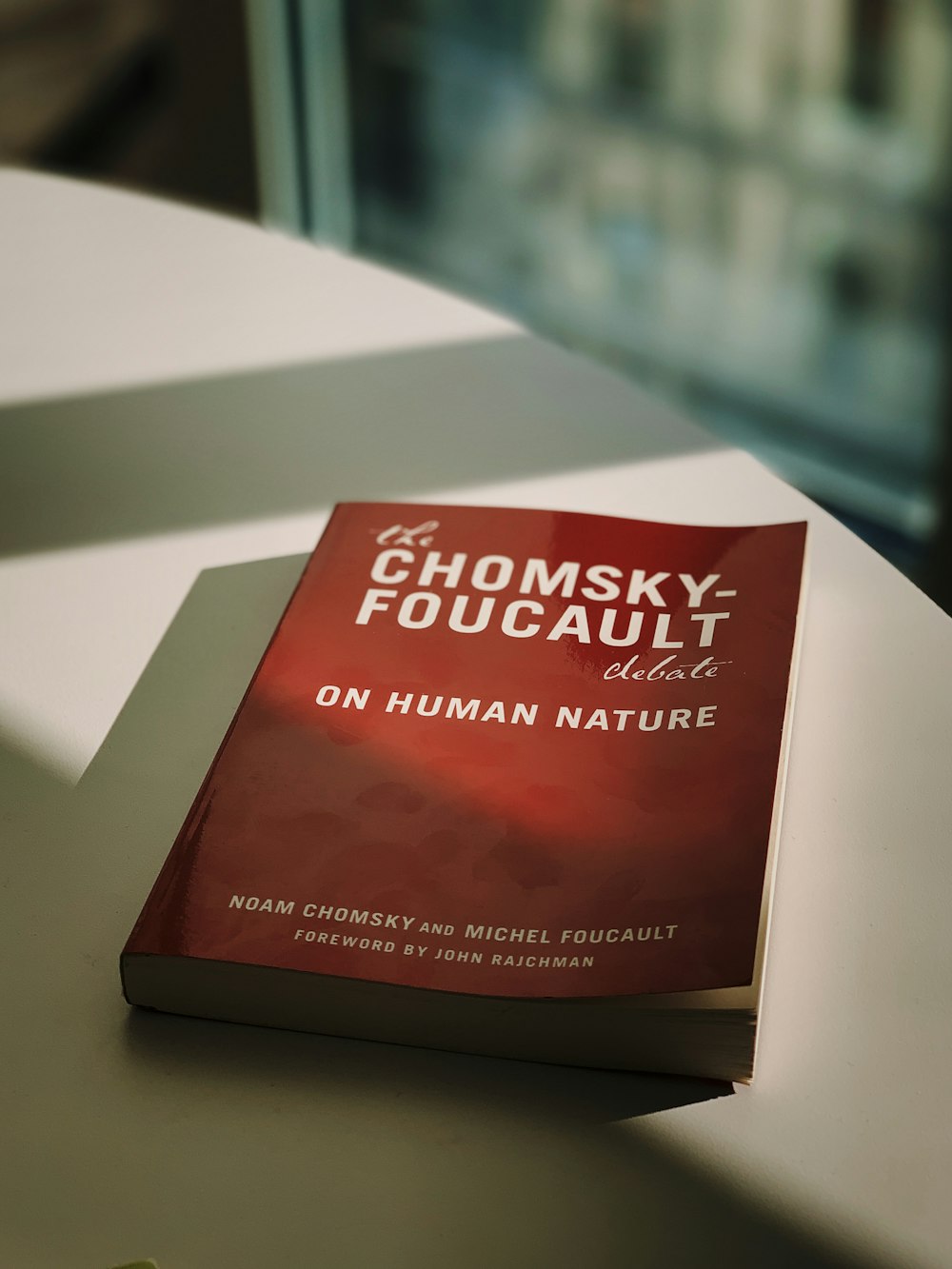Chomsky Foucault book on table