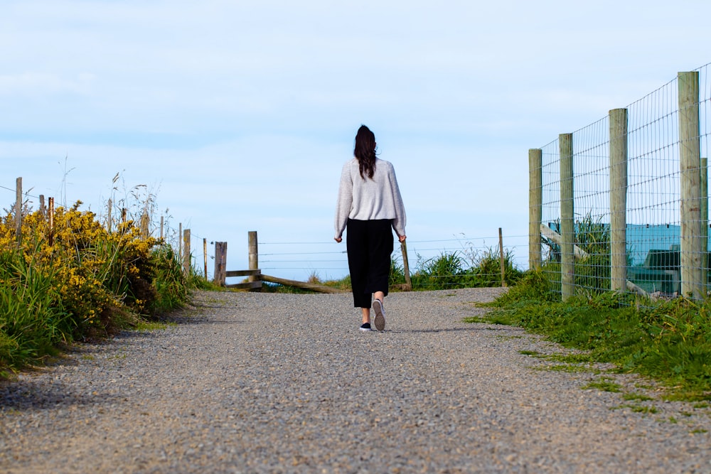 woman walking along path