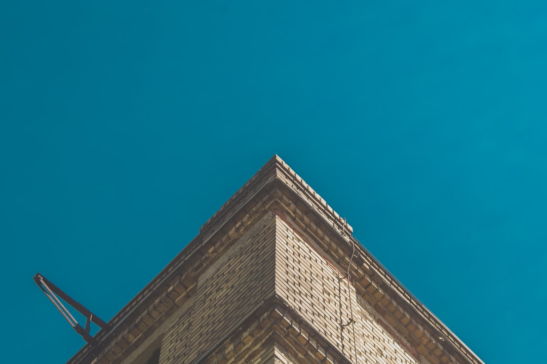 low angle photography of brown building