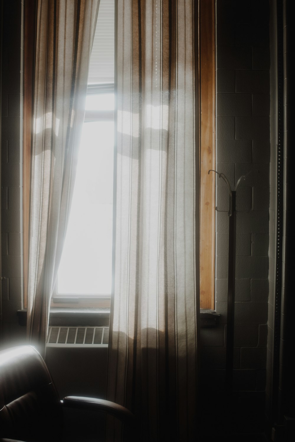 white curtains at window during daytime