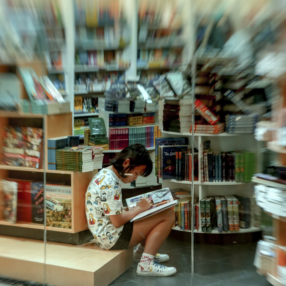 girl writing in book store