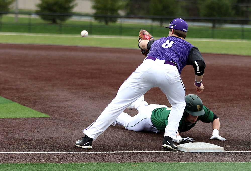 two men playing baseball game