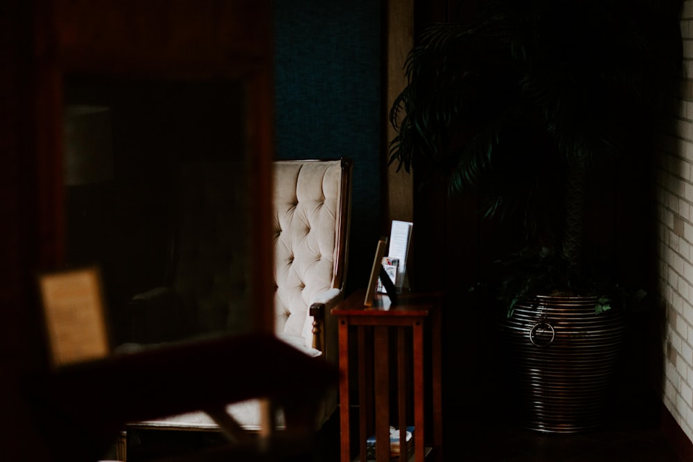 a chair and a table in a dark room