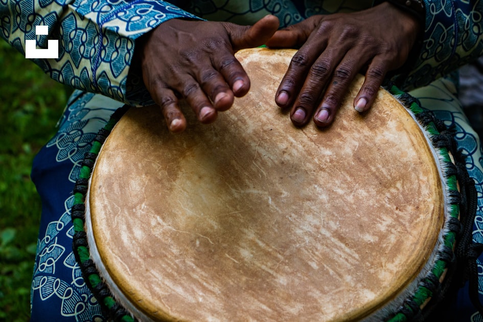 Person tapping on traditional drum instrument photo – Free Musical ...