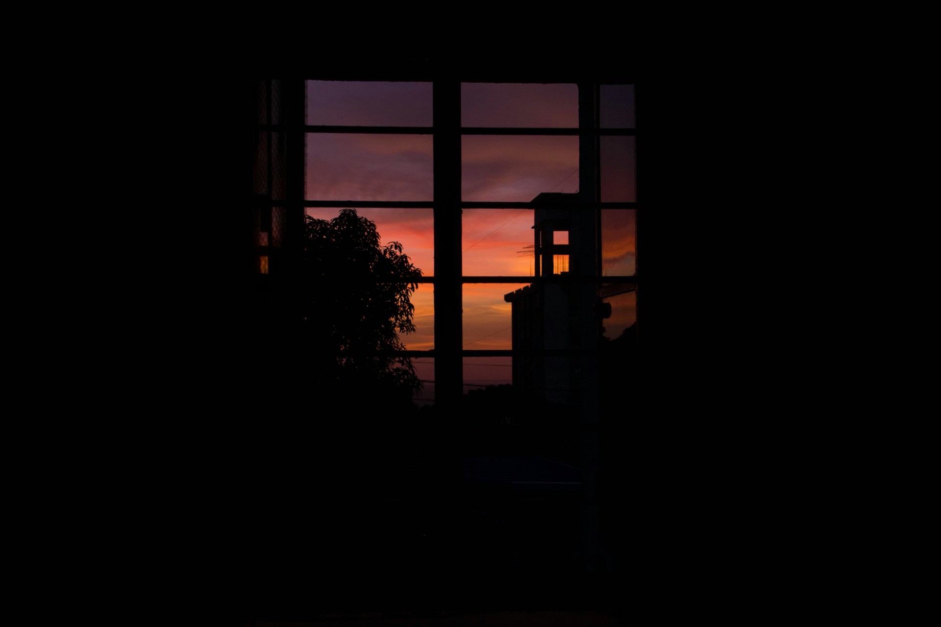 A striking frame from a short film showing a silhouette against a vibrant sunset, highlighting artistic cinematography.