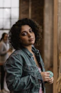 portrait photography of woman wearing blue denim jacket