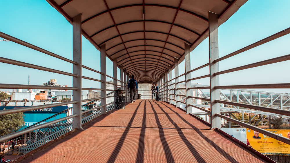 grey and brown overhead pathway