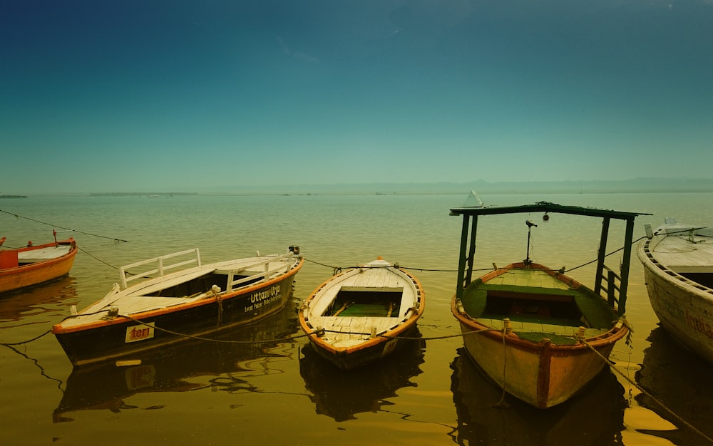 boats on harbour during daytime