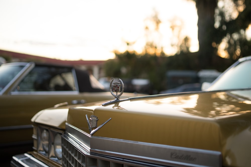 brown Cadillac classic car