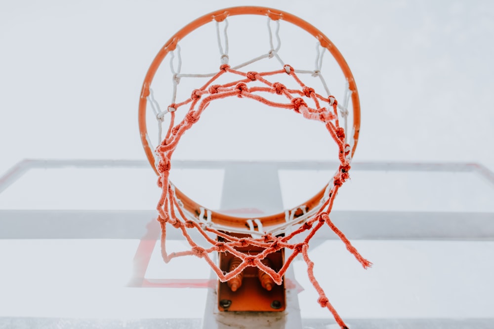 low-angle photography of basketball ring