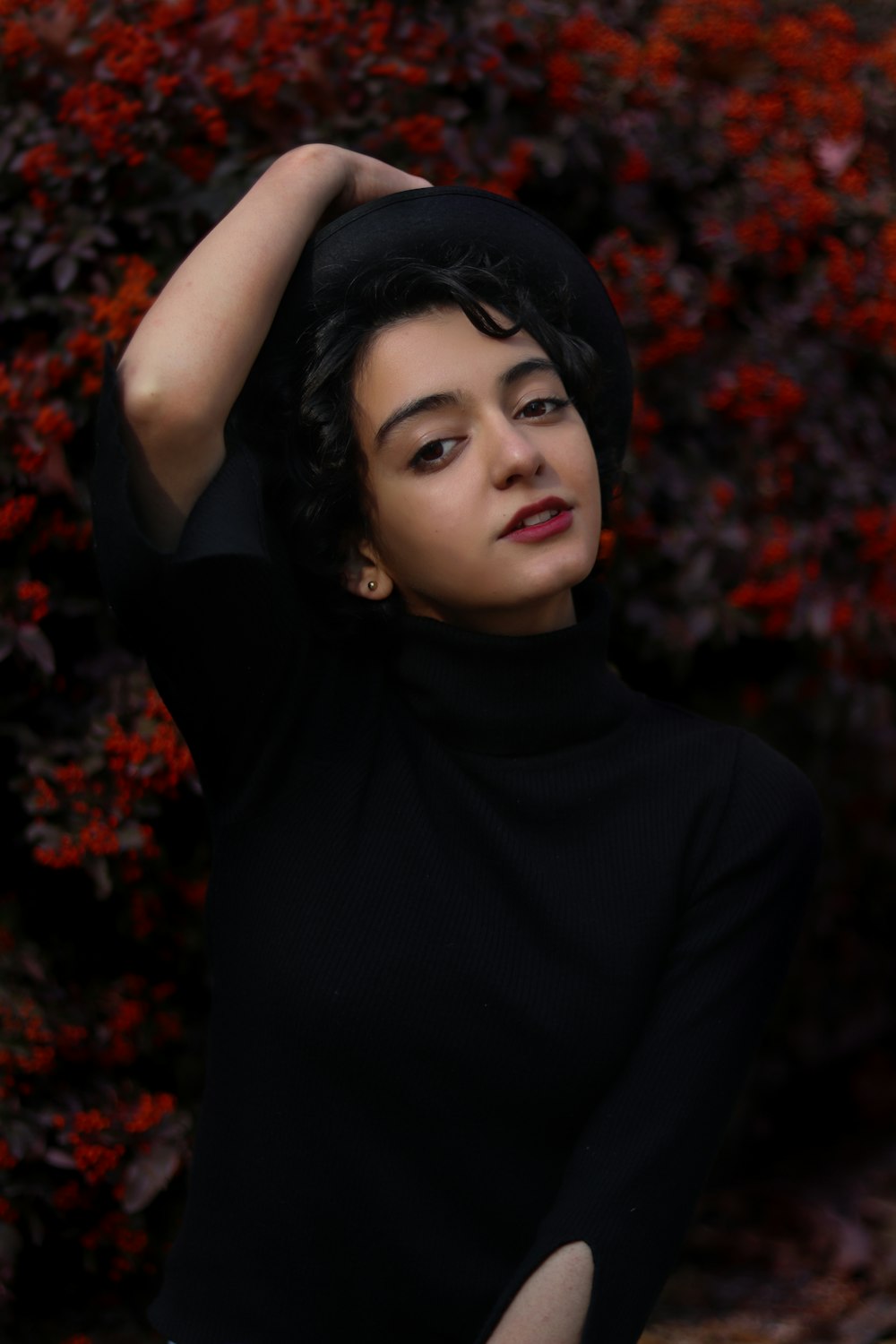 woman wearing black dress and hat during daytime