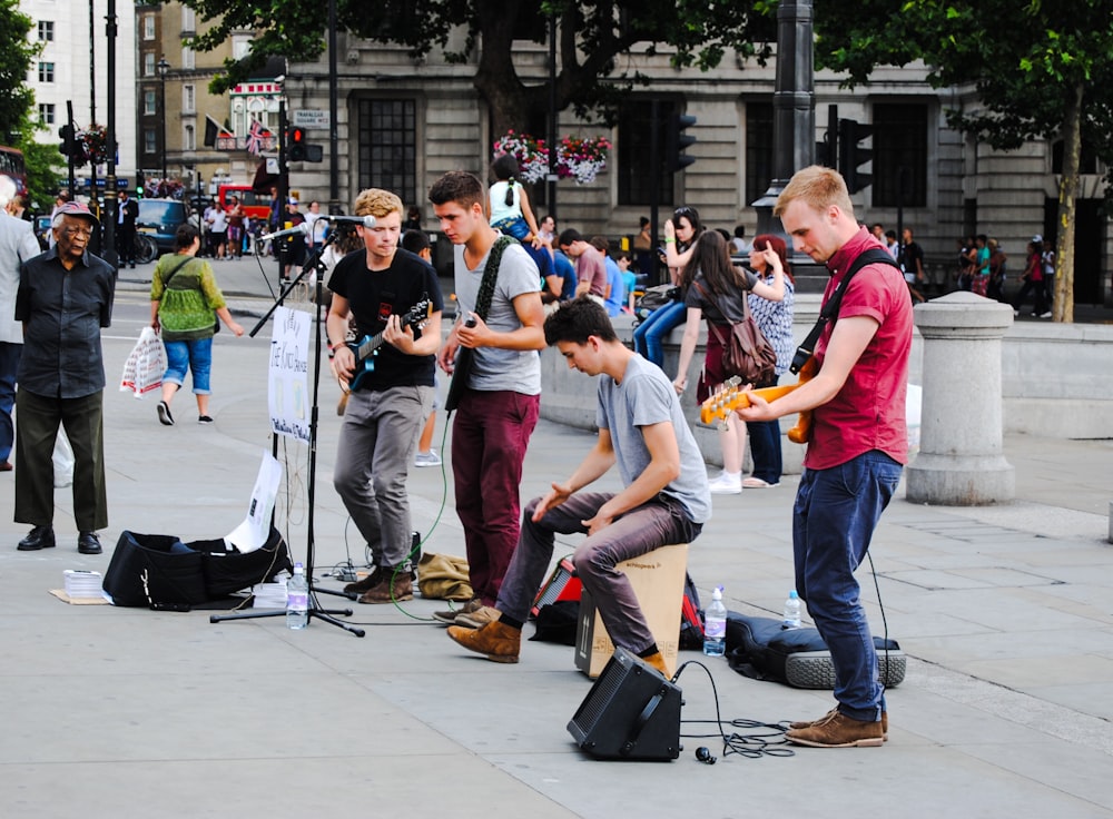 group of people playing music on the street
