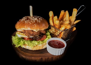 hamburger beside fries and ketchup