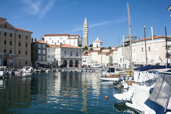Body of water near buildings with baots — Piran, Slovenia