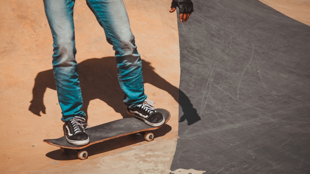 person riding skateboard during daytime