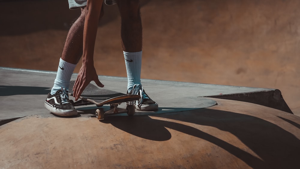 person over the black skateboard