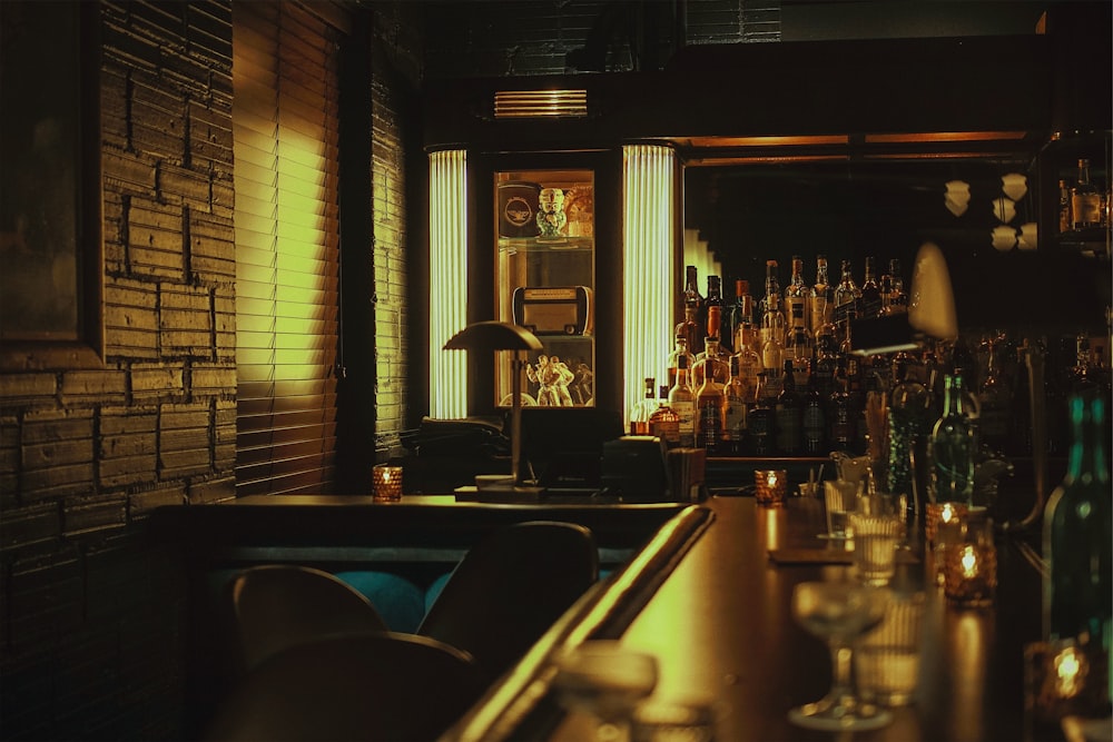 clear wine glass on table in bar