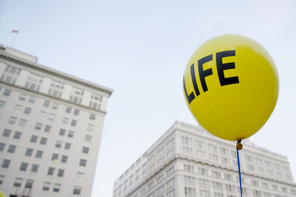 yellow life balloon