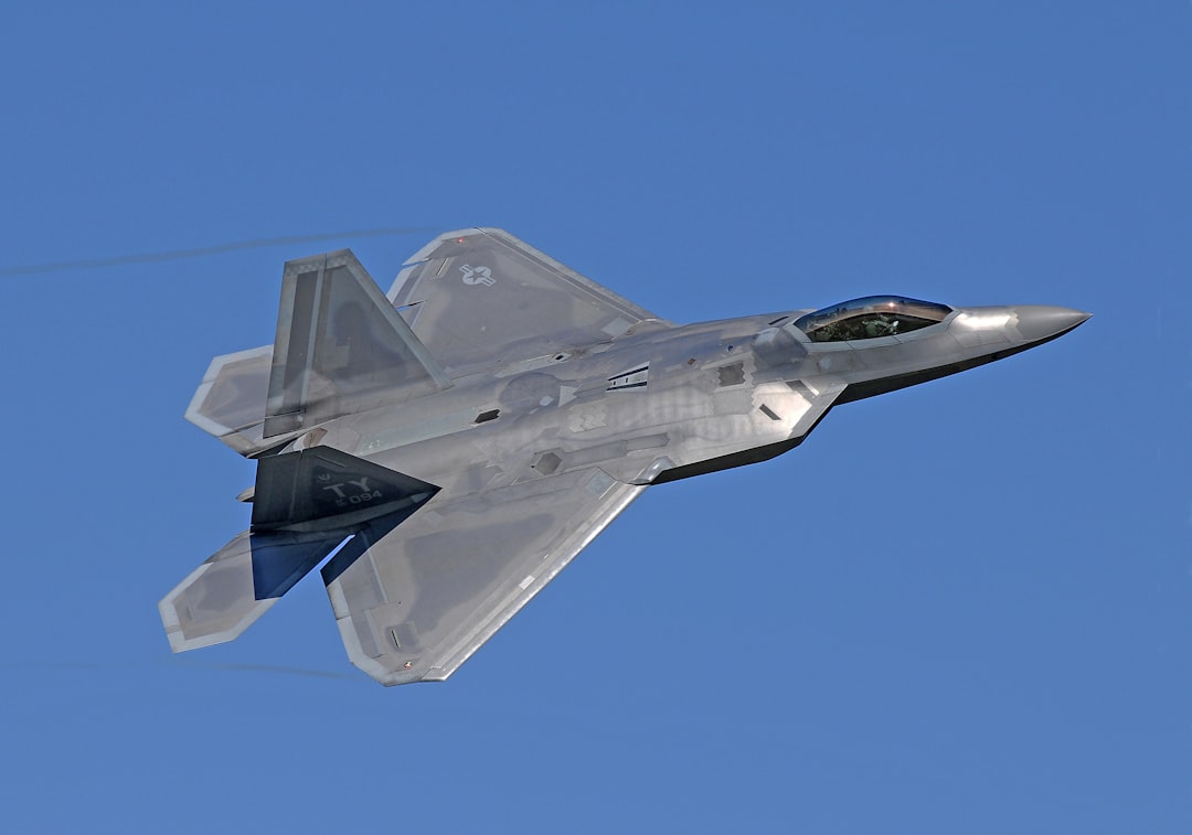 flying gray jet plane, Taken April 2006.<p></figure>Lockheed-Martin F22 Raptor .</p><p>Taking off while on a visit to RAF (US) Lakenheath. Eastern England.</p><p>( A ground to Air Photo.)