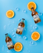 three Ginger Beer bottles