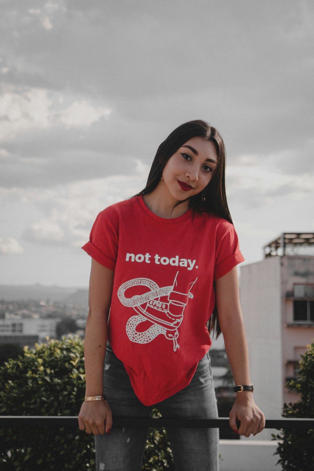 woman wearing red crew-neck with not today printed text