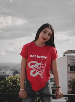 woman wearing red crew-neck with not today printed text