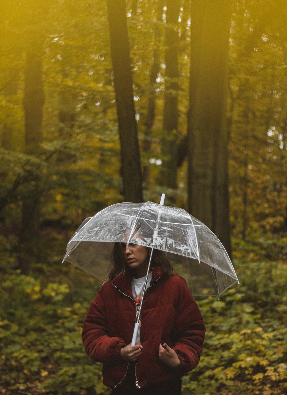 woman standing on forest