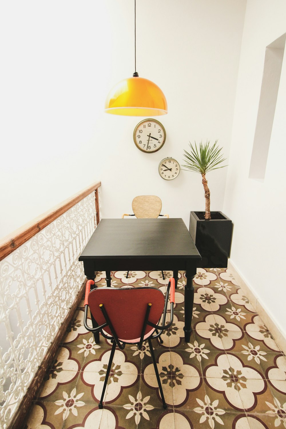 empty red chairs beside table