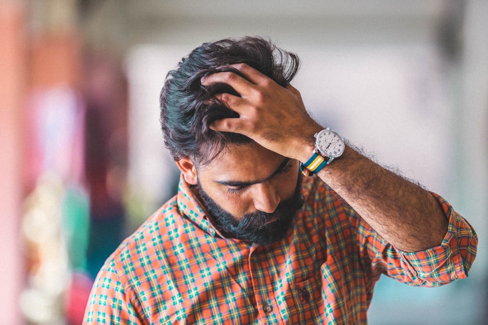 men's green, orange, and black plaid sports shirt