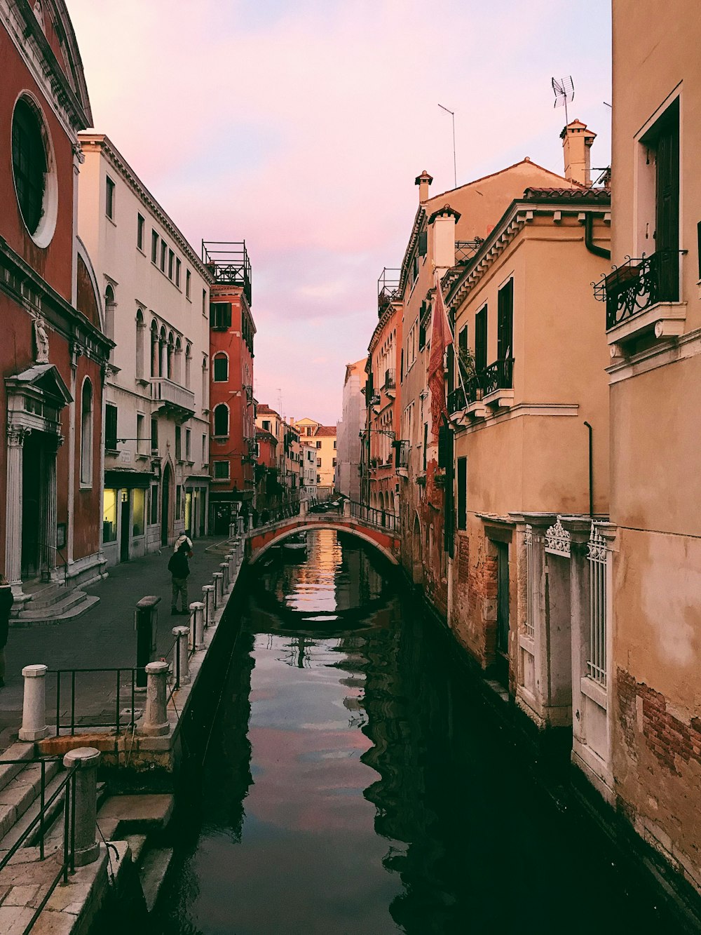 brown buildings along river