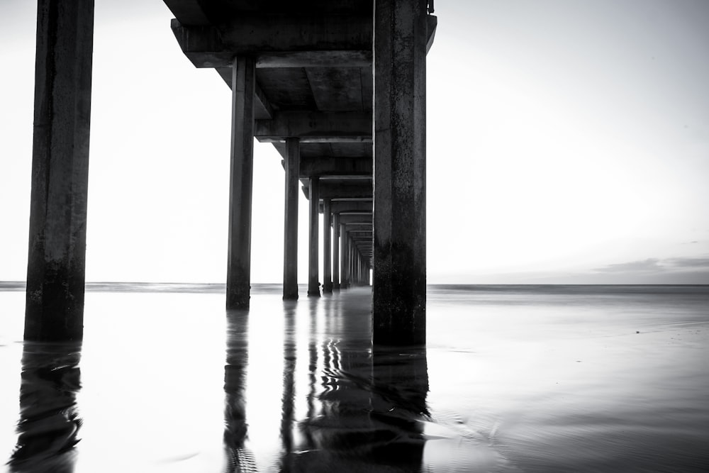 low-angle photography of concrete bridge