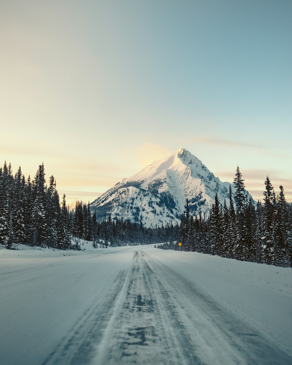 snowfield road and glacier mountain under blue sky