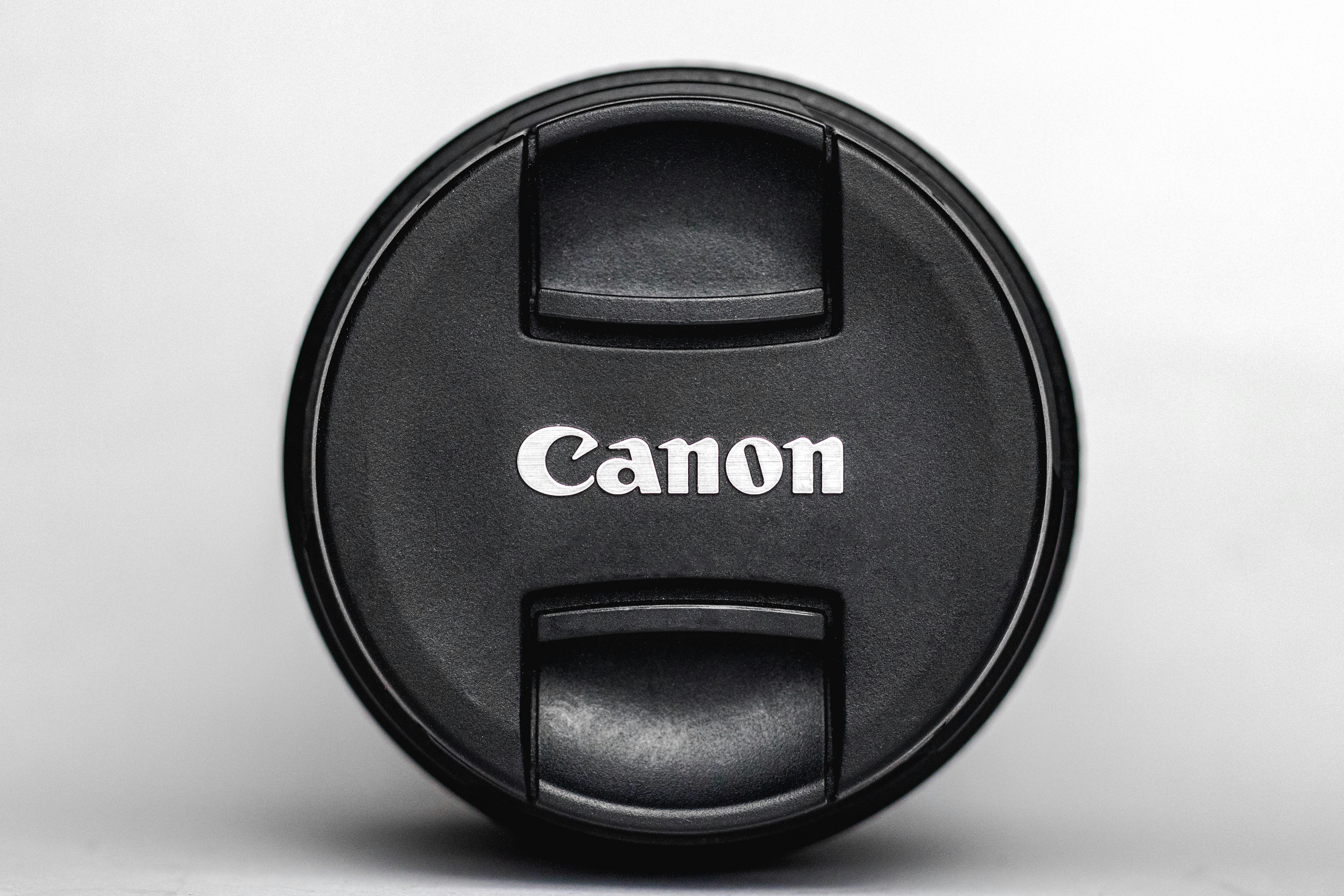black Canon lens cover