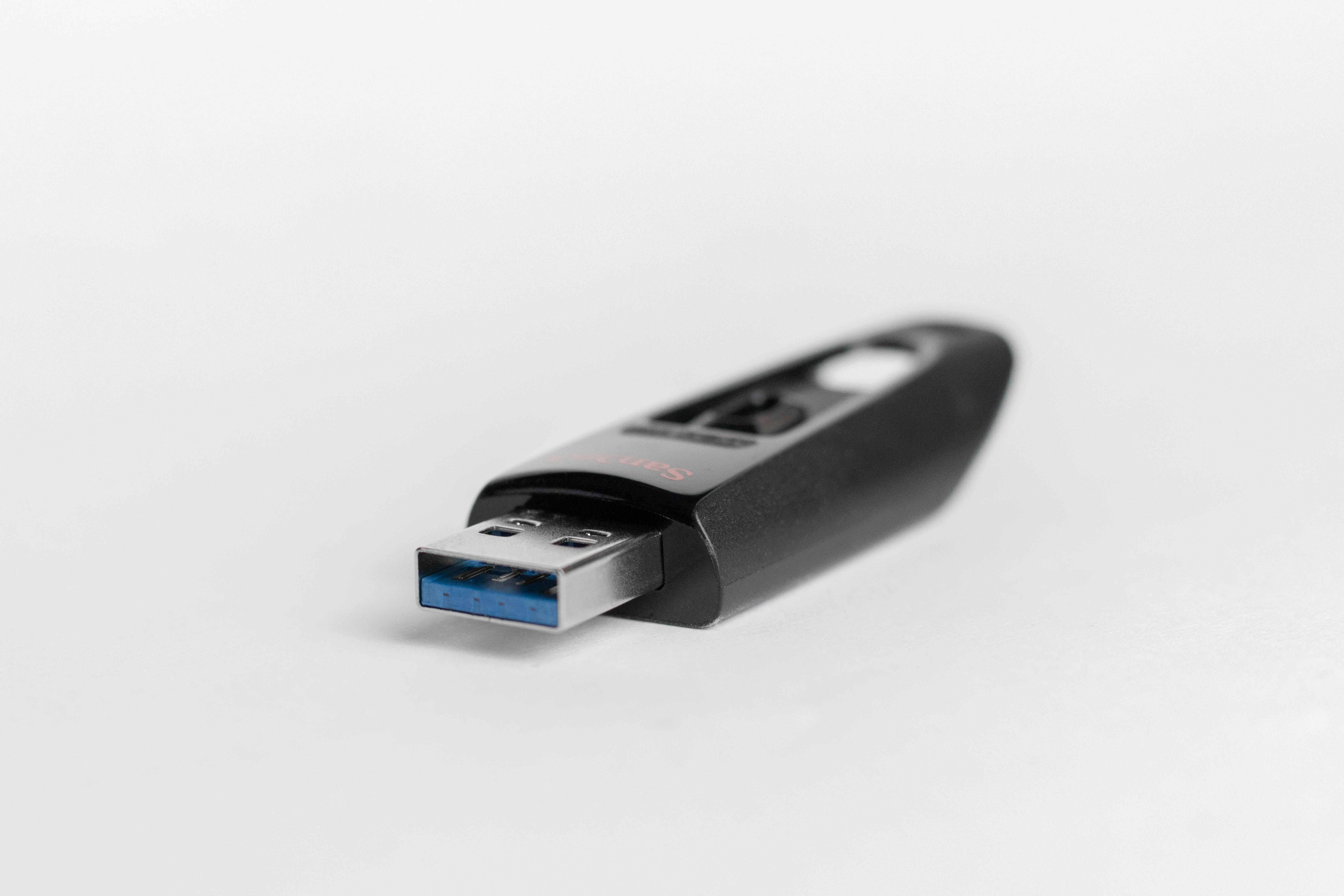 Close-up of a USB-C port with a futuristic data flow graphic