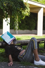 man sitting on surface