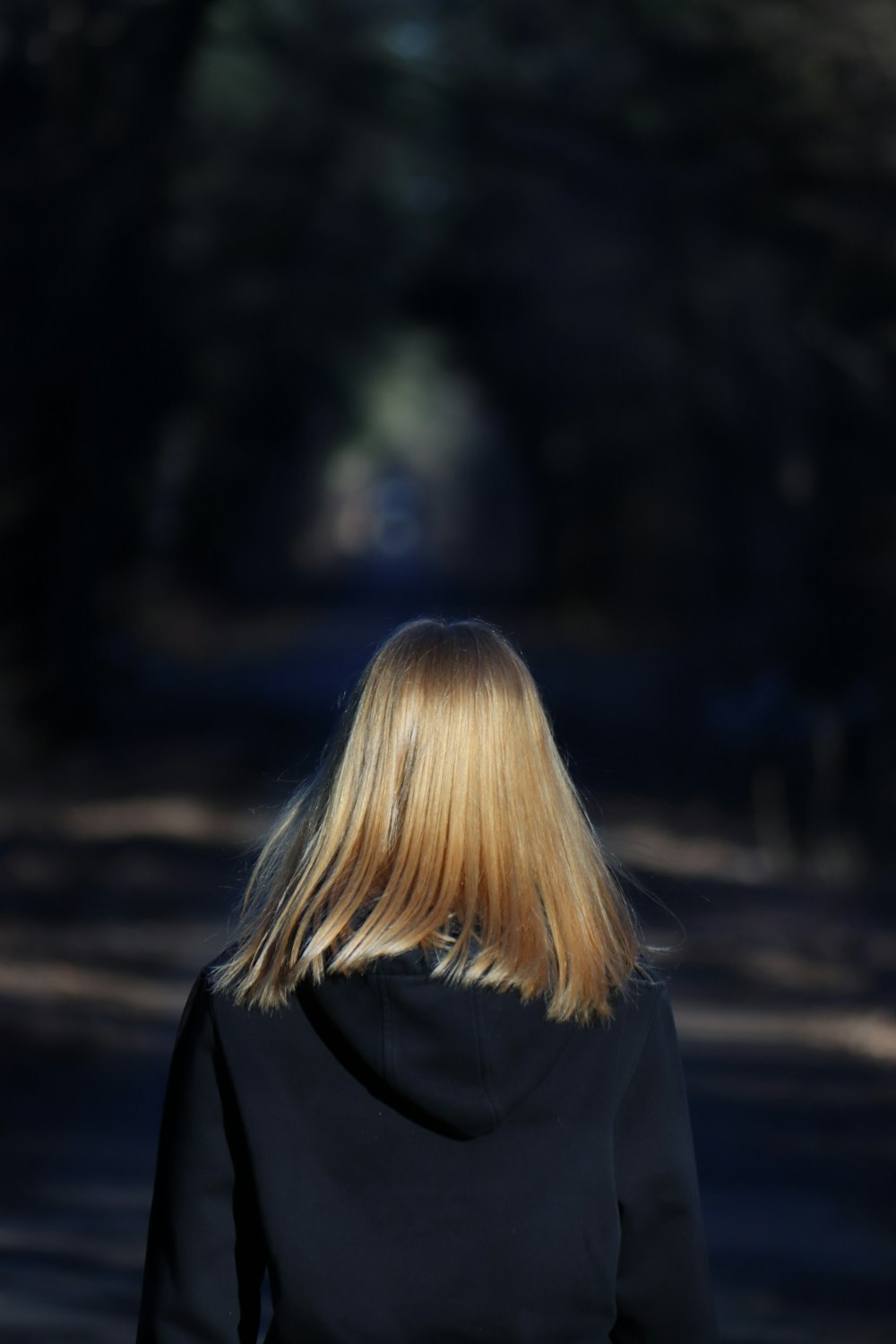 woman wearing black hoodie during daytime