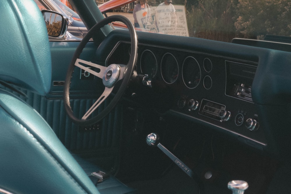 black and silver steering wheel