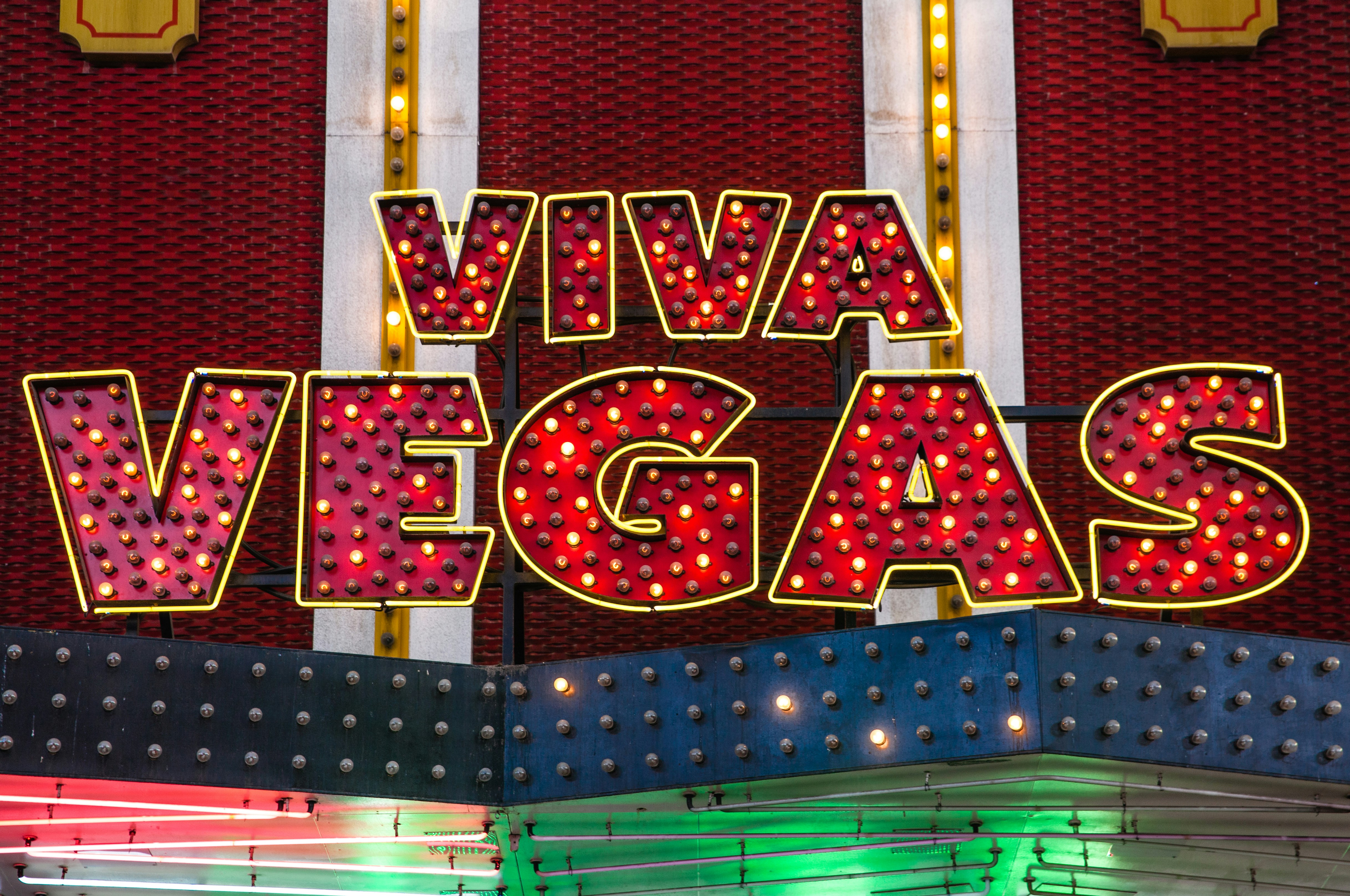 Light up sign saying "Viva Vegas" in red and gold