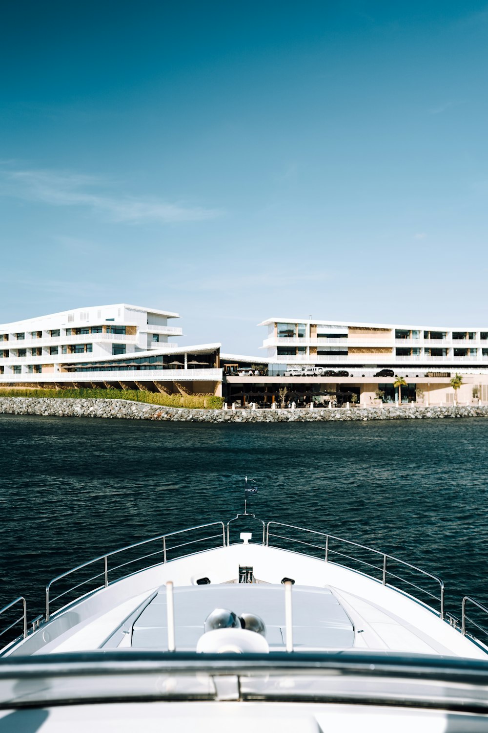 white yacht near building