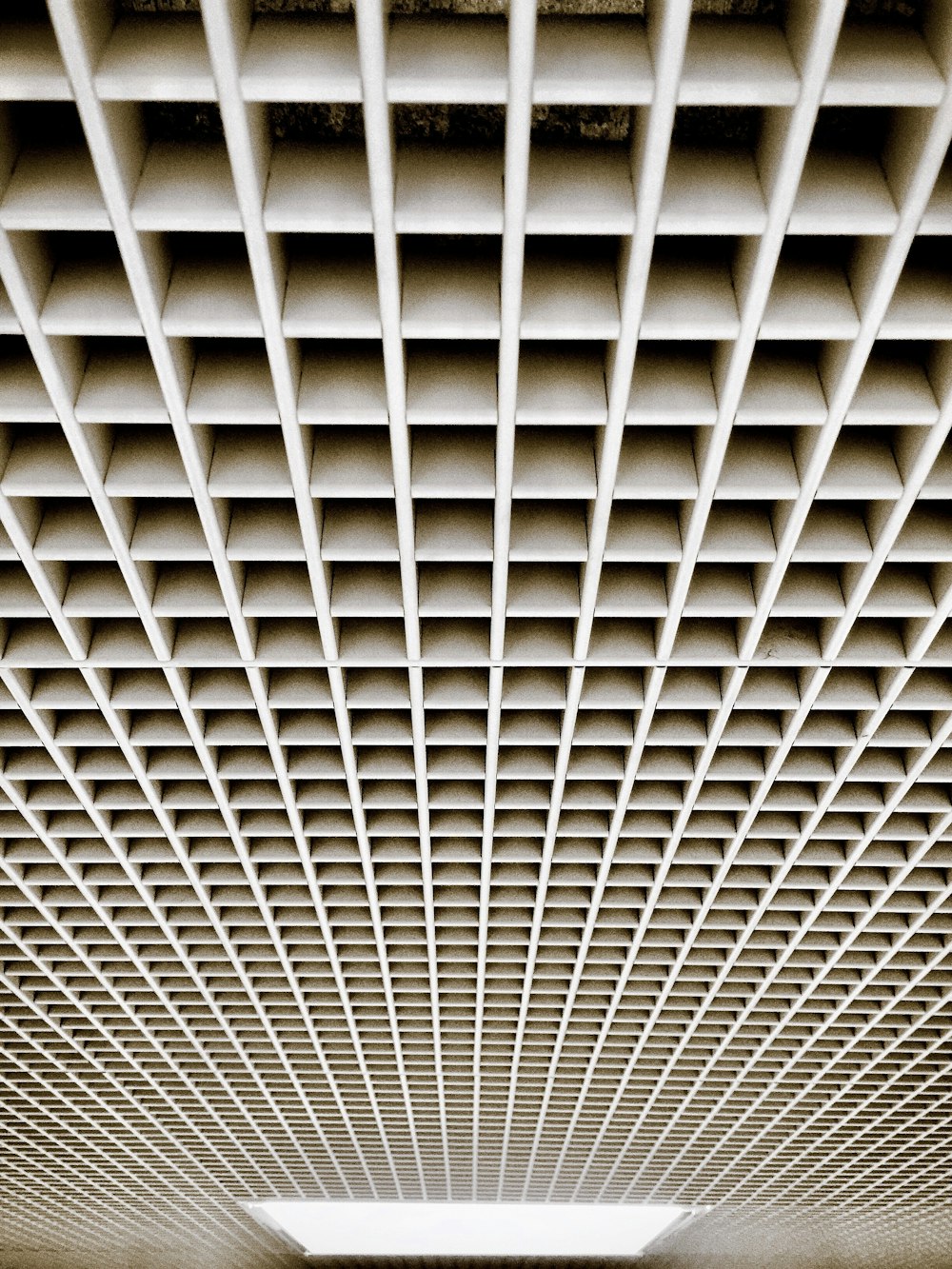 brown wooden cubbyhole ceiling