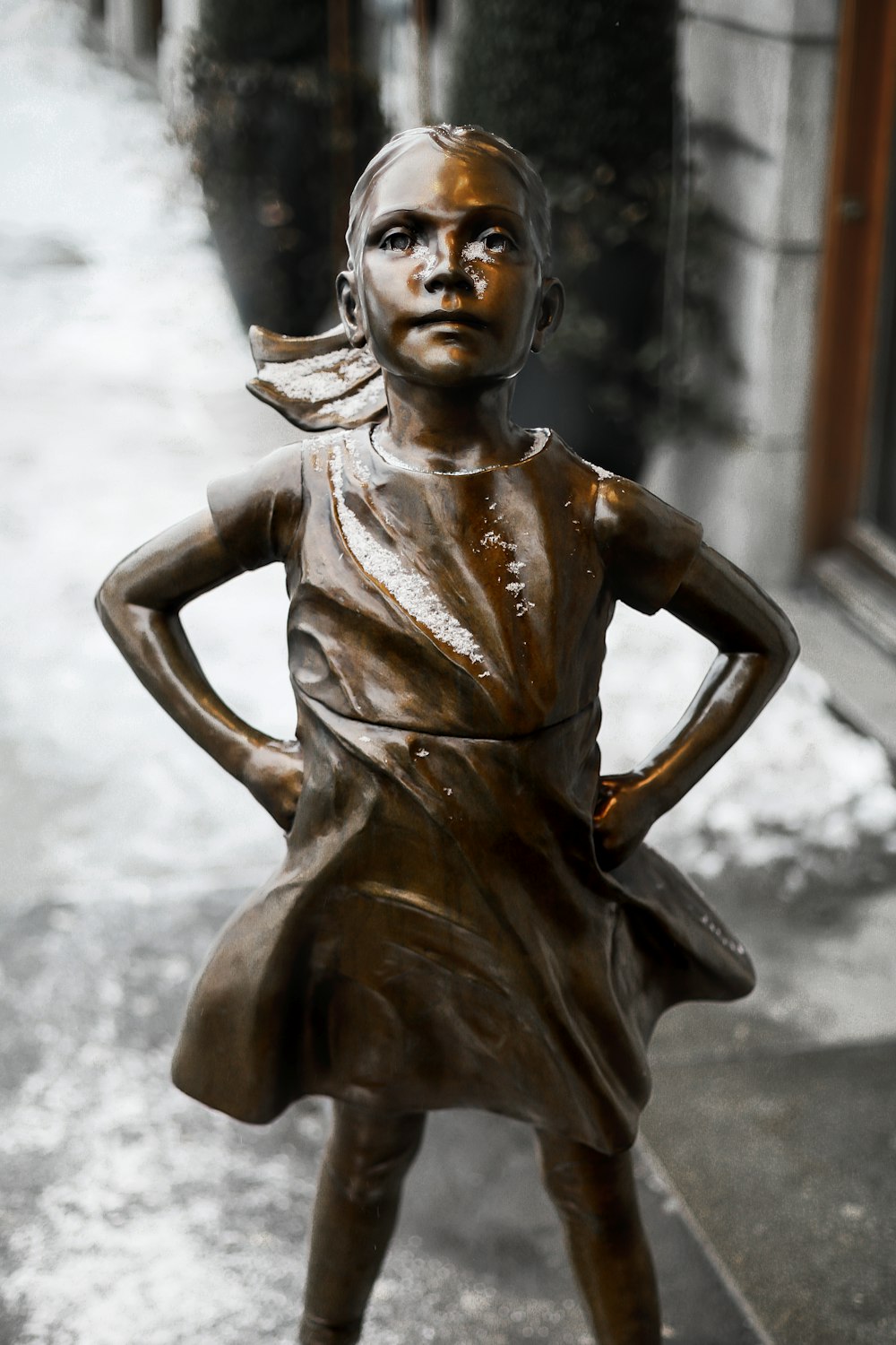 girl wearing dress figurine