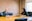 man and woman talking inside office